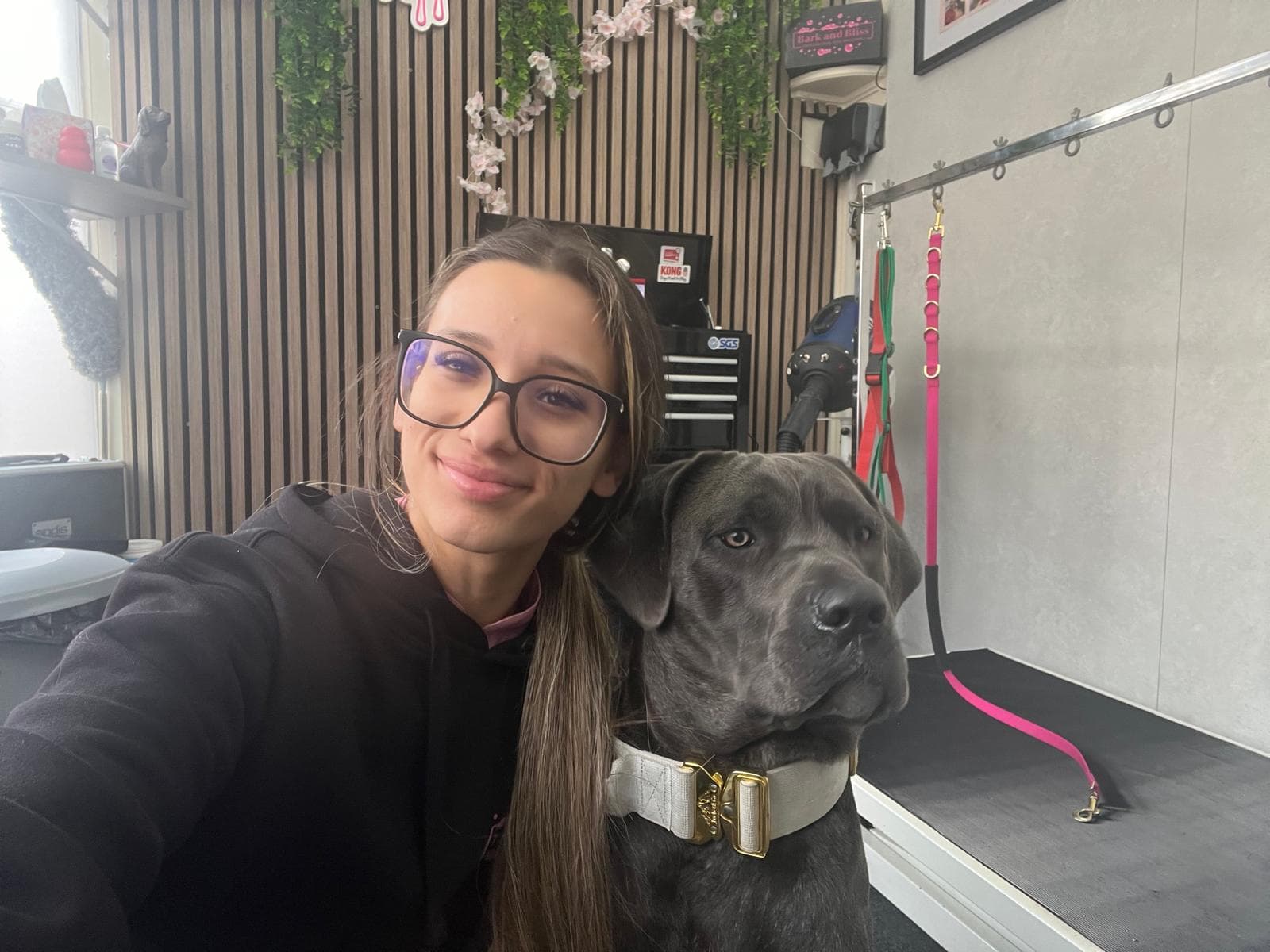 Kelly, the experienced groomer behind Bark & Bliss